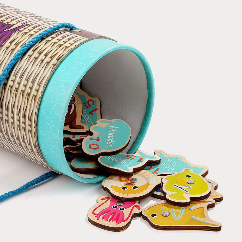 Close-up of wooden magnetic fish puzzle pieces with bright colors and child-safe smooth edges