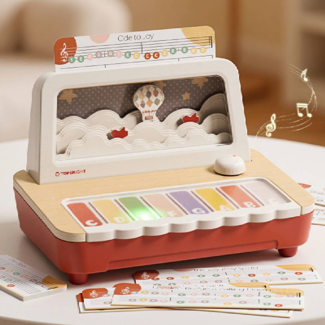 TOPBRIGHT Preschool Piano toddler musical toy with light-up keys, moving scene, and color-coded music sheets